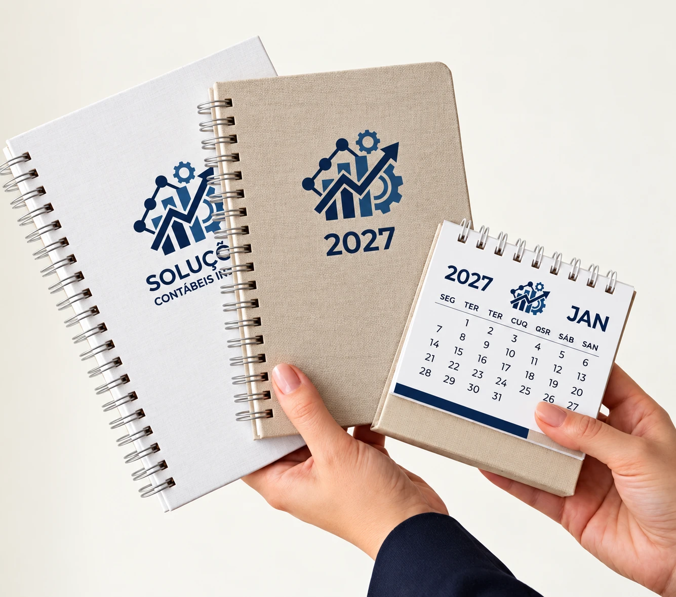 Cadernos e calendário de mesa 2027 produzidos para a Solução Contábil.